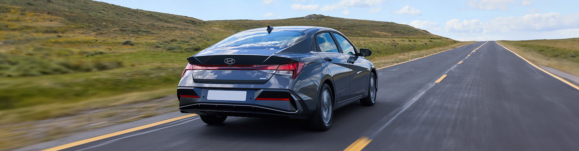 Hyundai i30 Sedan Hybrid 2024 on road