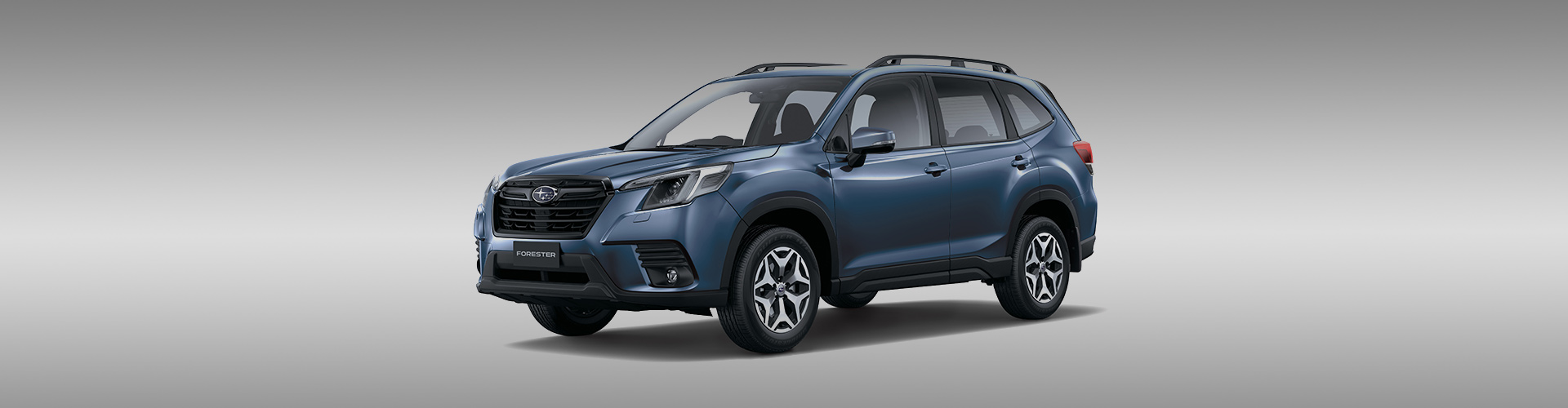 New Subaru Forester on grey background